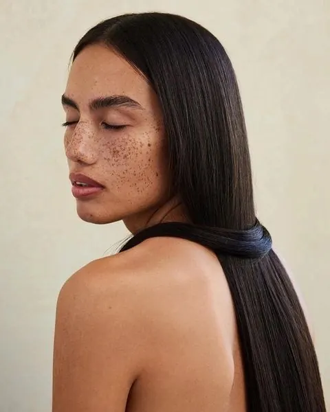 Portrait of a woman with freckles