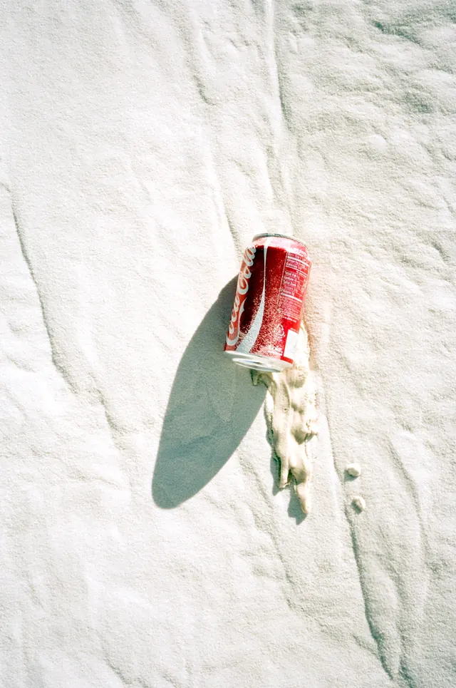 Red Can on Fabric