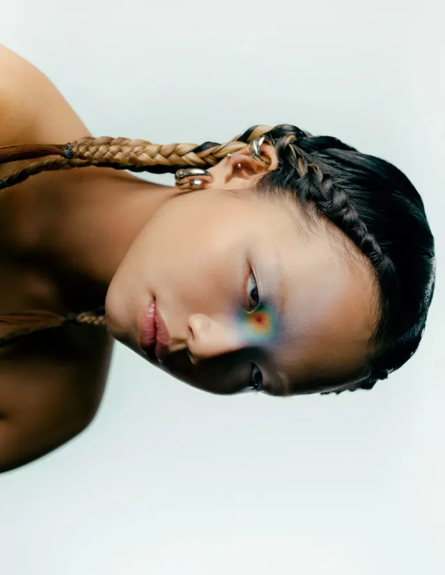 Portrait of a woman with braided hair