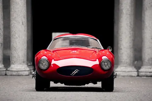 Red Sports Car in Architectural Setting