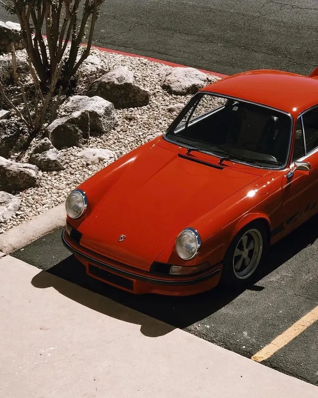 Red Vintage Porsche on Asphalt