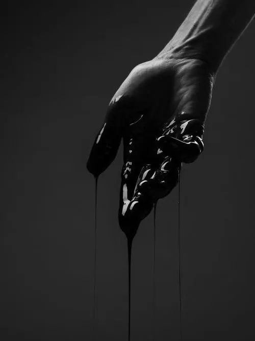 Hand with Dripping Liquid
