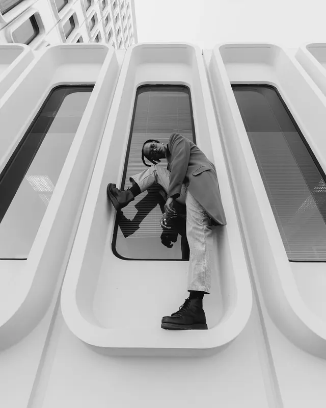 Person in Futuristic White Pod