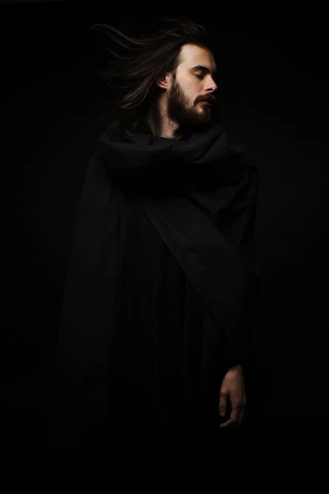 Man in Dark Drapery Portrait