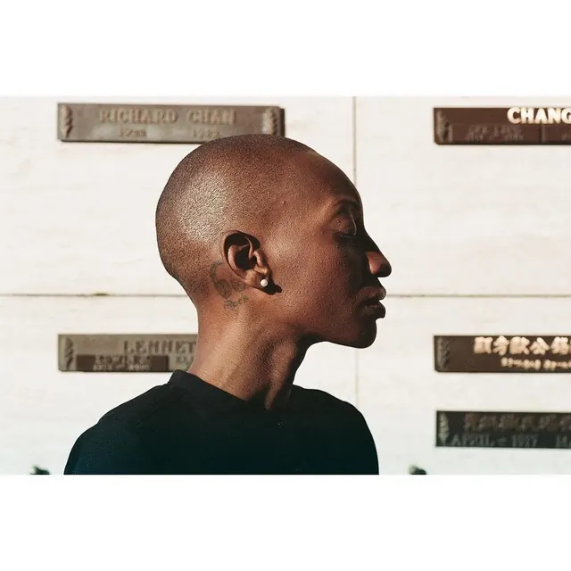 Portrait of a man with earrings