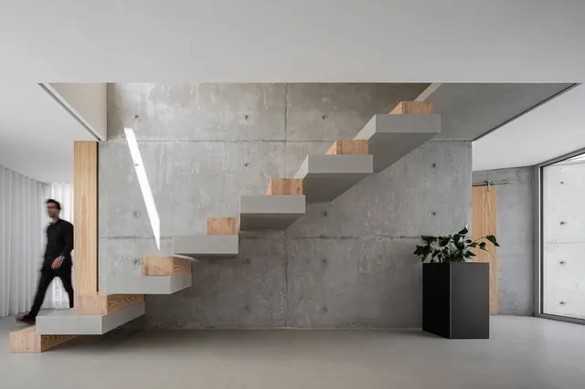 Modern Industrial Interior with Floating Stairs