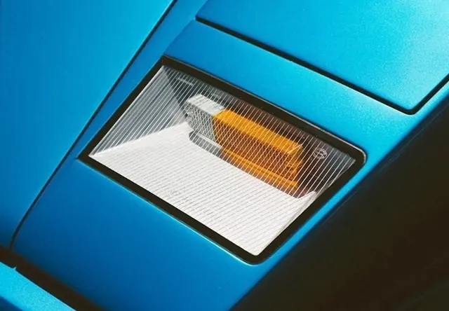 Blue and orange heating element detail, photographic, minimal, vibrant