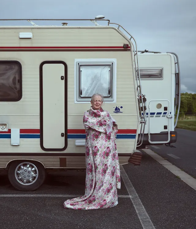 Woman in Floral Robe with Camper