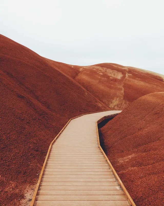 Red Sand Dunes with Wooden Walkway