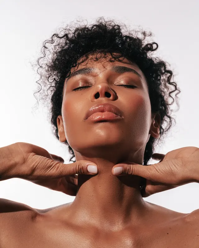 Portrait of a Woman with Hands on Face