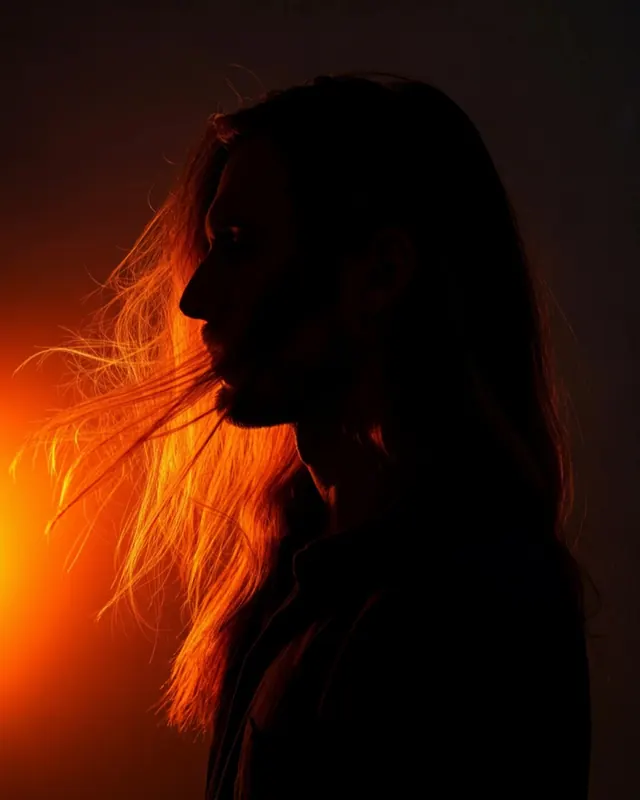 Silhouette Portrait with Orange Glow