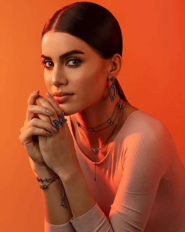 Butterfly jewelry portrait on orange, photographic, luxury, warm