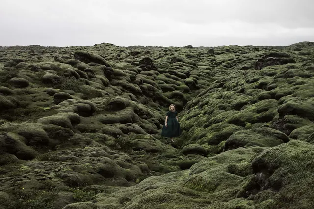 Person in Mossy Landscape