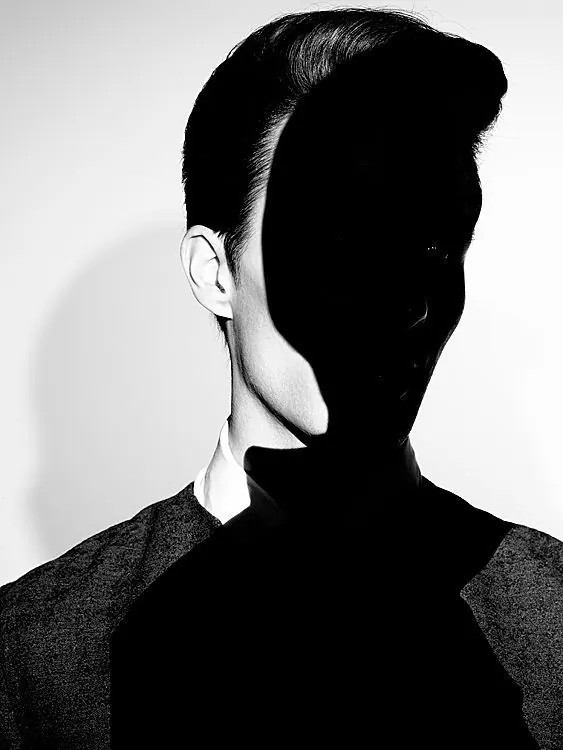 High-Contrast Portrait with Shadow Overlay