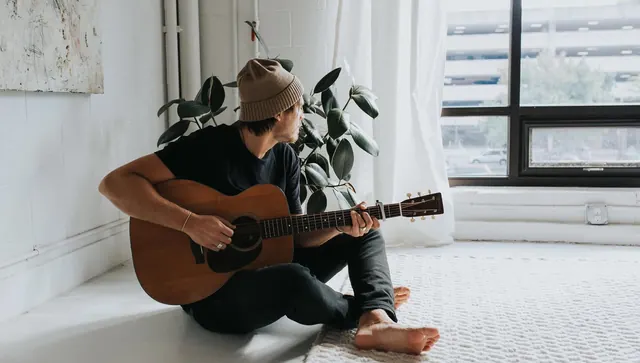 Musician with Acoustic Guitar