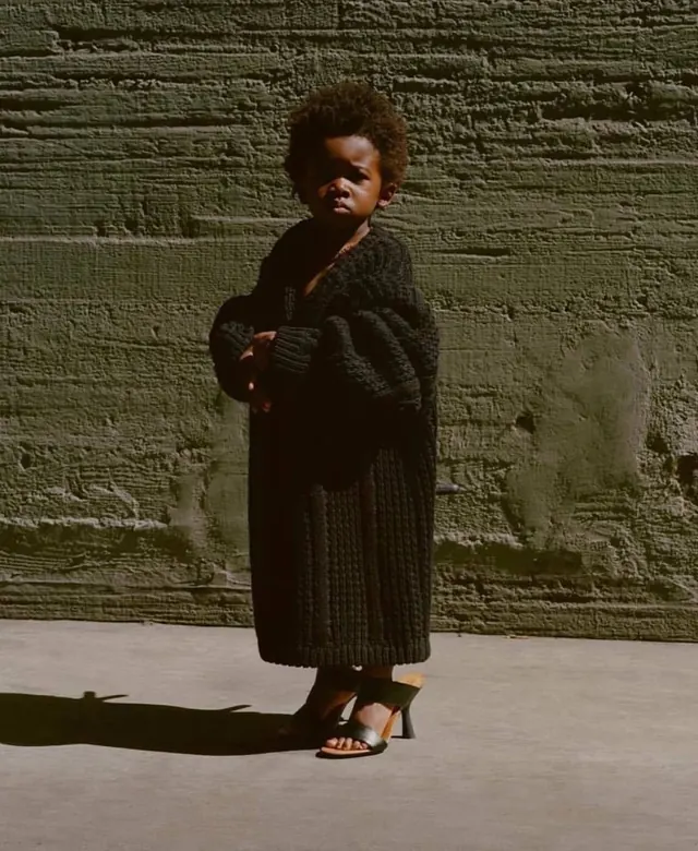 Portrait of a Woman in Textured Urban Setting