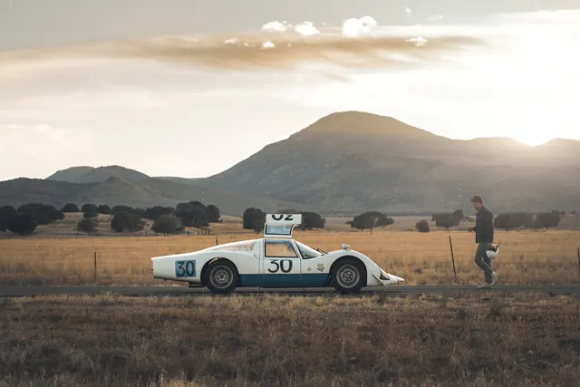 Vintage Race Car in Field