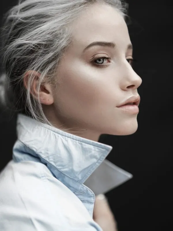 Portrait of a woman in high-collar garment