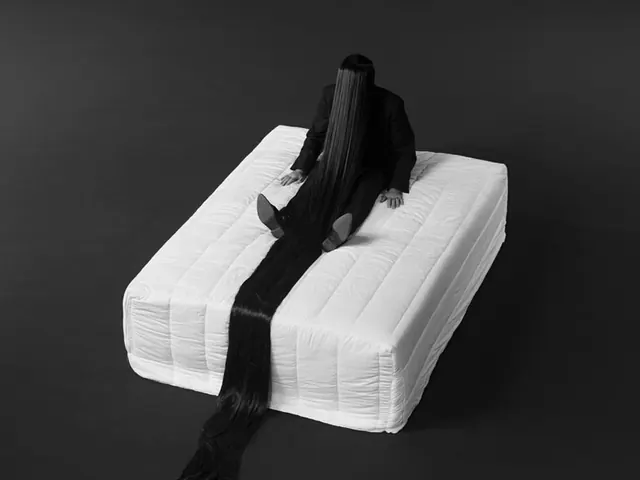 Monochrome Figure on White Mattress