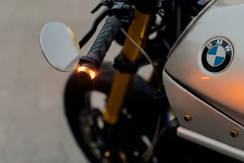 BMW motorcycle detail close-up, minimal, photographic, muted