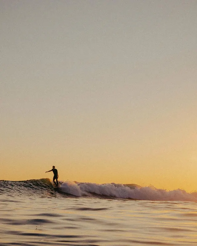 Surfer Silhouette at Sunset