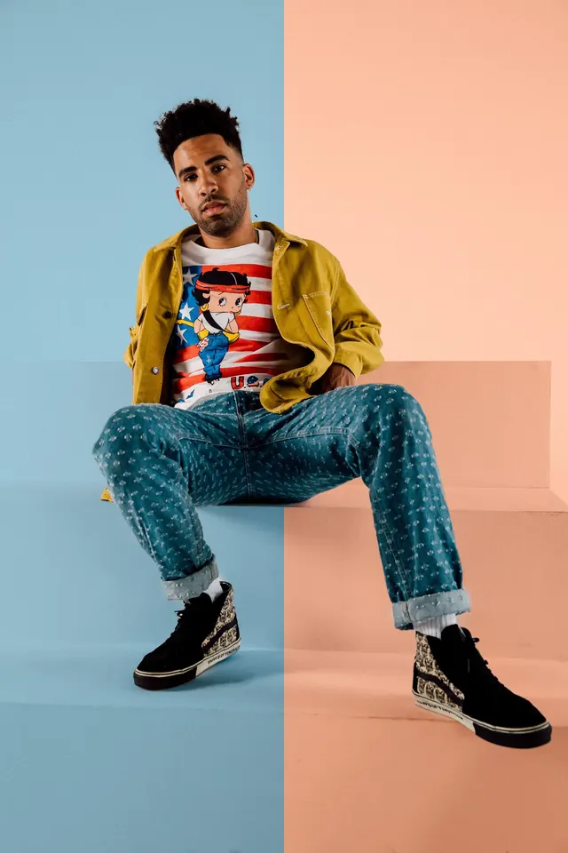 Man in Betty Boop t-shirt and yellow jacket fashion portrait, photographic, light