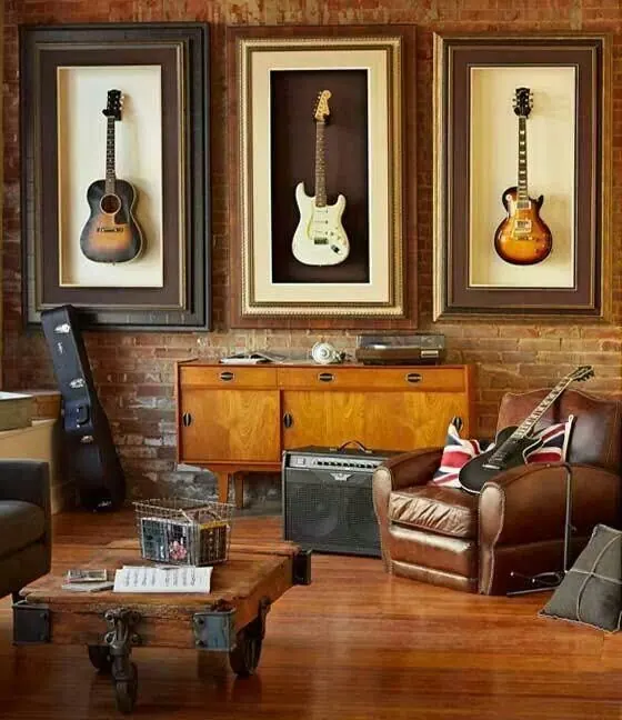 Brick wall music room with framed guitars, organic, editorial, warm