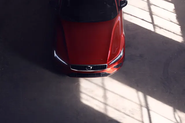 Red Car in Shadowed Interior