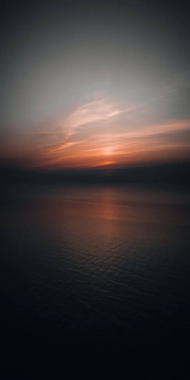 Sunset over Calm Water
