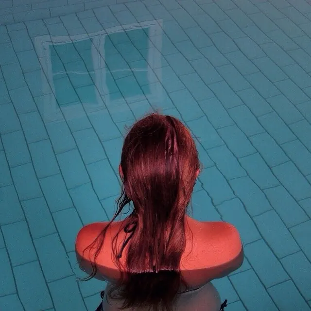 Woman in Swimming Pool