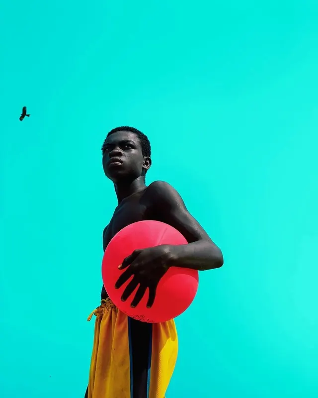 Portrait with Red Sphere