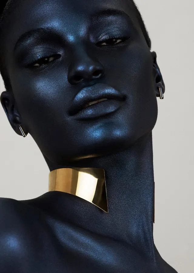 Metallic Blue Portrait with Gold Jewelry