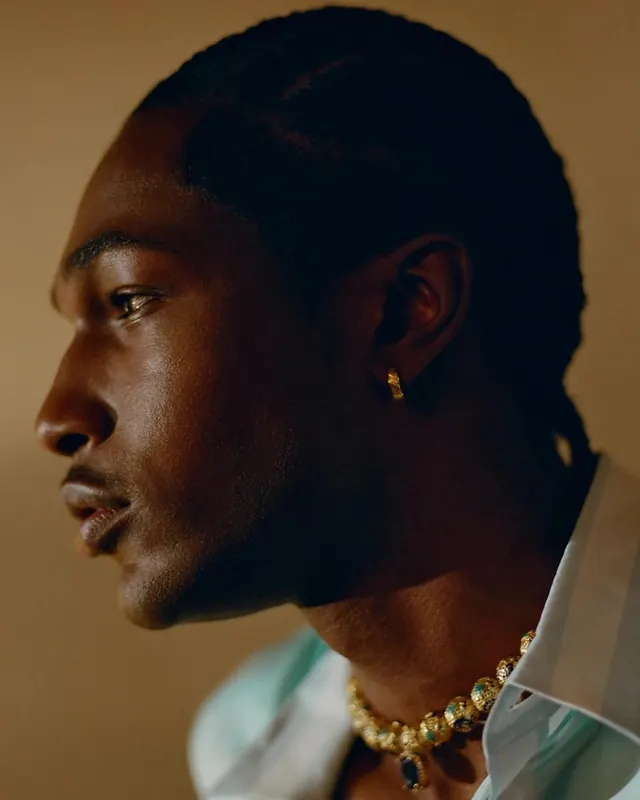 Portrait of a man with gold jewelry