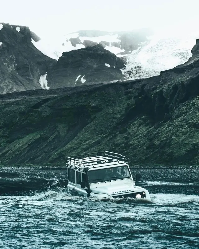 Off-road Vehicle in Mountain Landscape