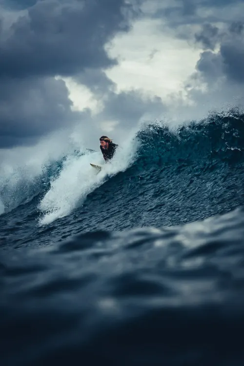 Surfer in a Large Wave