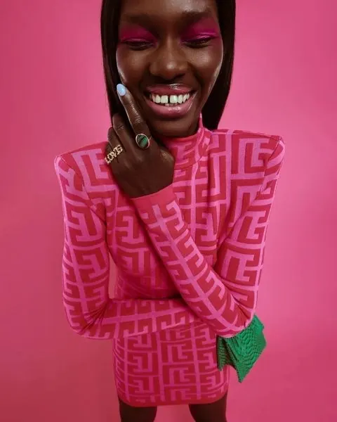 Vibrant Pink Portrait with Geometric Pattern