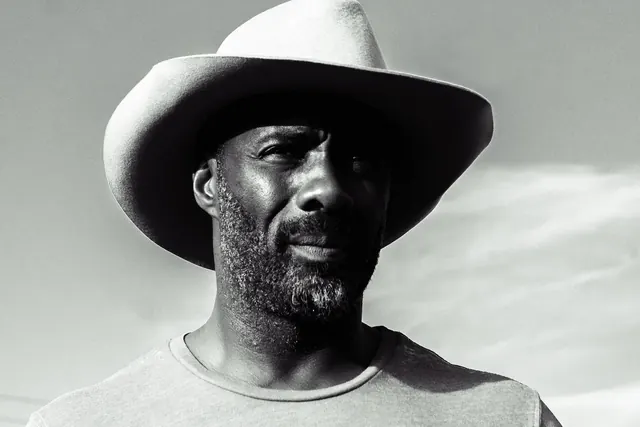 Black and White Portrait of a Man in a Hat