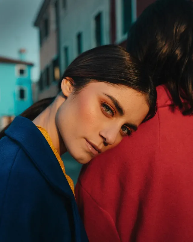 Portrait of Two People in Vibrant Outerwear