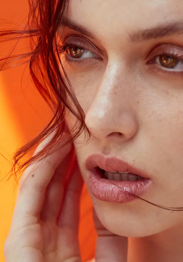 Close-up Portrait with Orange Lighting