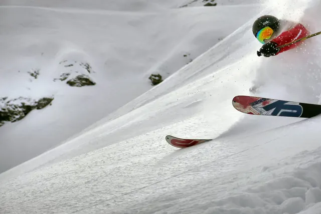 Powder-spray skier action shot, photographic, maximalist, light