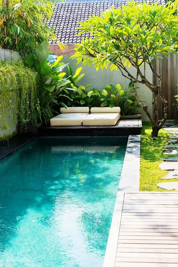 Tropical lap pool courtyard, organic, photographic, vibrant