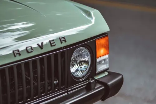 Sage green Land Rover detail, photographic, retro, muted