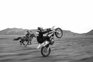 Motorcycle and Rider in Desert