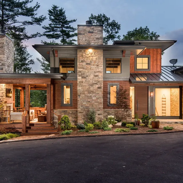 Organic modern mountain residence—warm stone and timber, organic, minimalist, warm