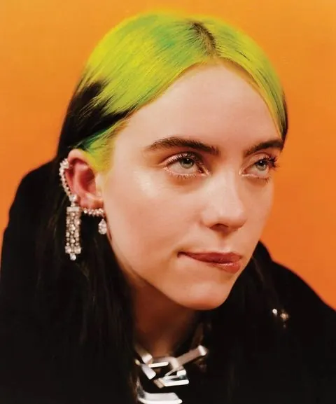 Billie Eilish orange editorial portrait, editorial, photographic, vibrant