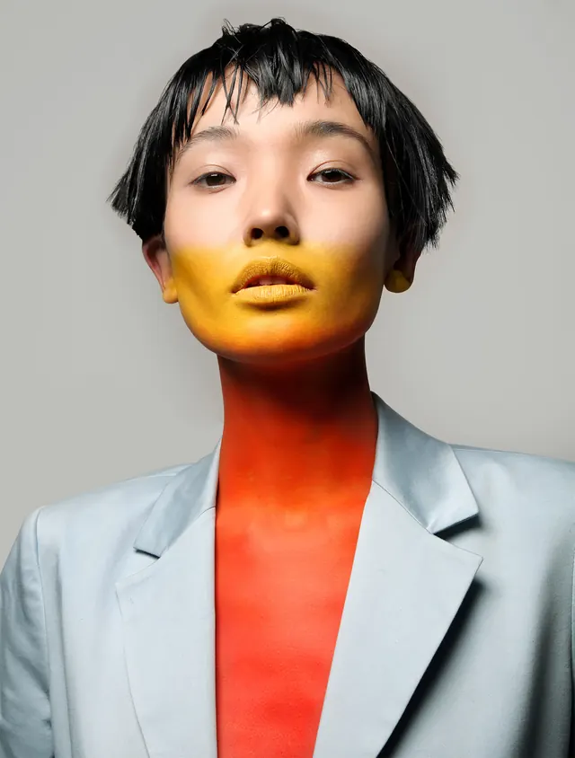 Gradient face-paint editorial portrait, editorial, minimal, vibrant
