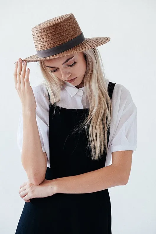 Straw boater hat fashion lookbook portrait, photographic, minimal, light
