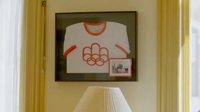 Framed 1976 Olympics ringer tee display, photographic, retro, vibrant
