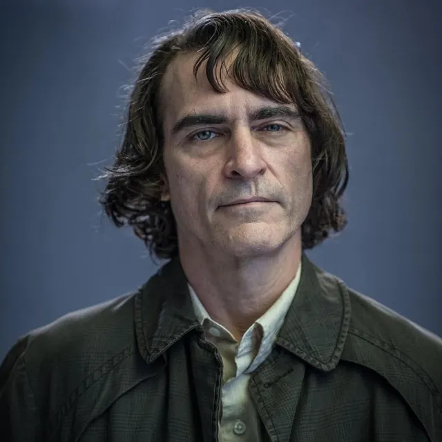 Joaquin Phoenix Joker film portrait, photographic, cinematic, muted