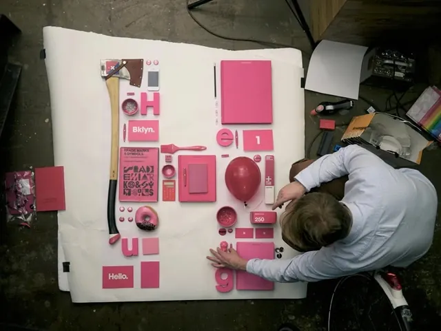 Pink knolling letter H arrangement, playful, photographic, vibrant